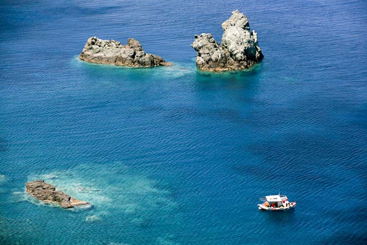 Explore the island on a boat